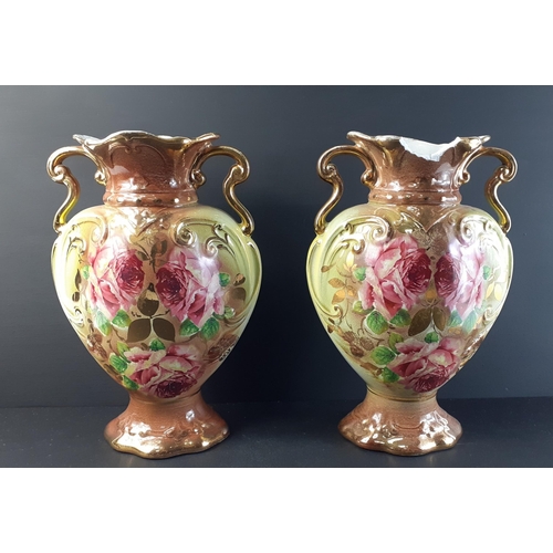 230 - A pair of highly decorative floral and gilt vases standing 30cm approx.  A/F#278