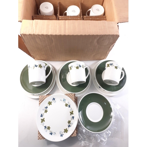 253 - An 18 piece SUSIE COOPER coffee service with ivy pattern.  All within original box#303