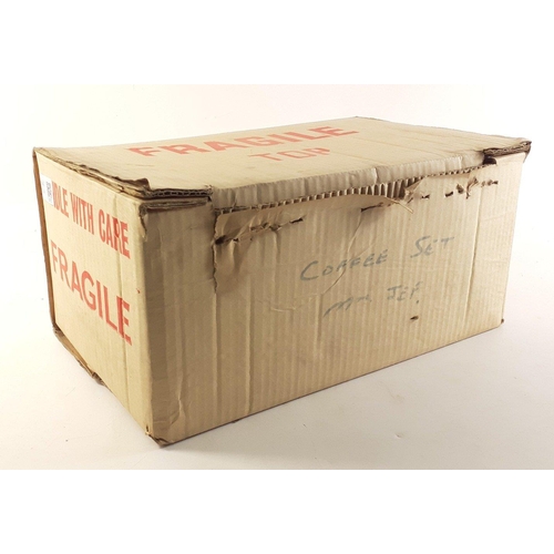 253 - An 18 piece SUSIE COOPER coffee service with ivy pattern.  All within original box#303