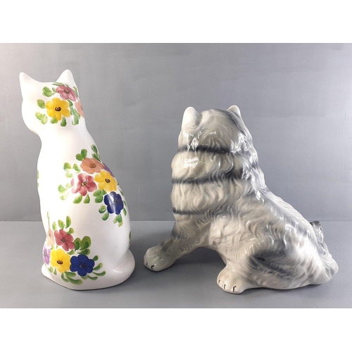 281 - Two decorative cats one hand-painted for Redusta, 30cm tall (chip to one ear) and the other a long-h... 