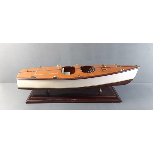 299 - A model speed boat on a plinth -50cm length x 14cm width x 12cm height approx#350