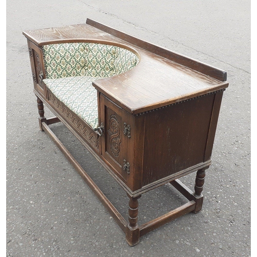 131 - A Demi Lune recessed charm seat with cupboard to sides 117cm x 43cm x66cm approx.  In good clean use... 