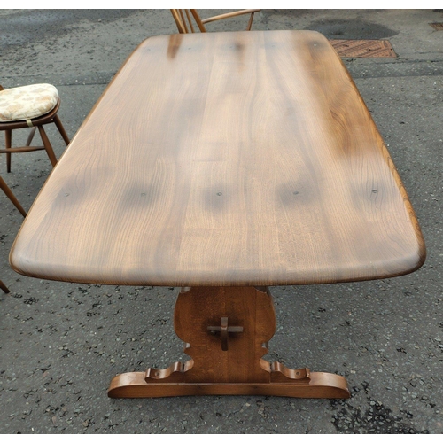 151 - ERCOL six place dining table with chairs. All in good condition. Chairs with detachable light cream ... 