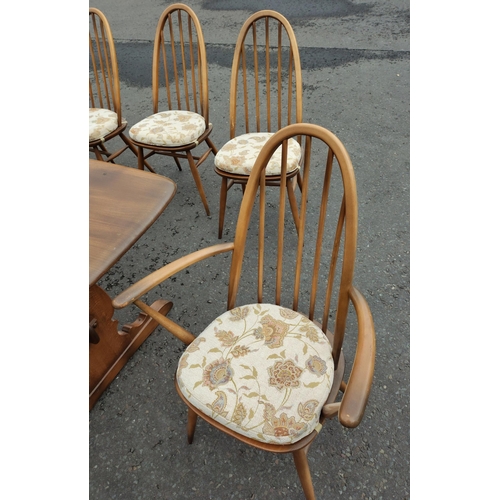 151 - ERCOL six place dining table with chairs. All in good condition. Chairs with detachable light cream ... 