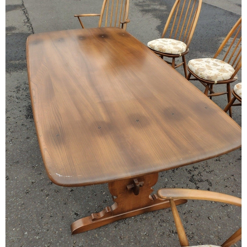 151 - ERCOL six place dining table with chairs. All in good condition. Chairs with detachable light cream ... 