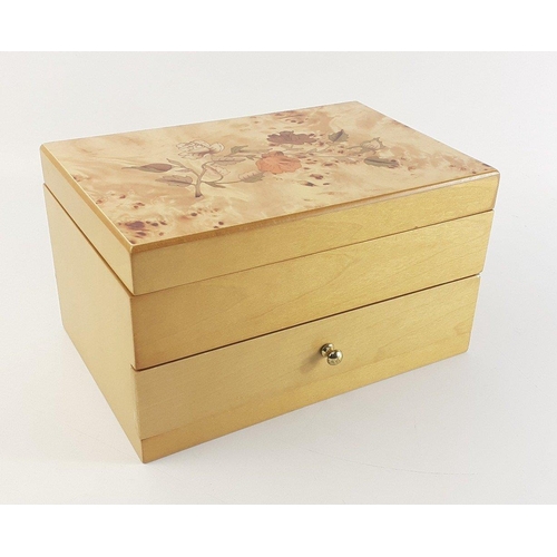 83 - An attractive light wood jewellery box with lower drawer and mirror in lid.  Comes with contents of ... 
