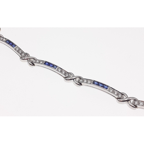 9 - PICCHIOTTI 750 stamped 18ct white gold bracelet encrusted with 36 diamonds and 18 sapphires.  A trul... 