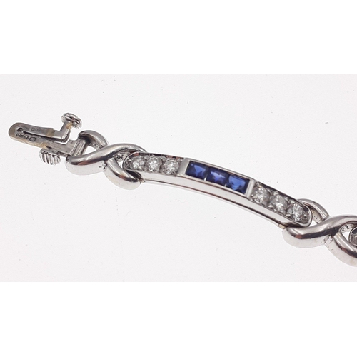 9 - PICCHIOTTI 750 stamped 18ct white gold bracelet encrusted with 36 diamonds and 18 sapphires.  A trul... 