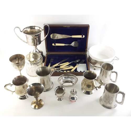 60 - A mixed lot of silver plated items to include 2 goblets, 5 tankards, presentation trophy, canteen of... 