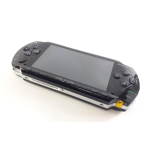 SONY PSP hand held game in case with power adaptor and battery. Grand ...