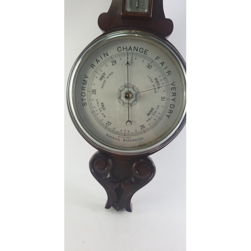 123 - A wooden banjo barometer/thermometer, approx 80cm long.#129