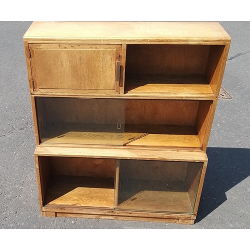128 - Legal style cabinet with sliding doors and cupboard. Consists of a base section and 2 joined section... 