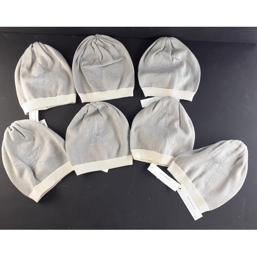 296 - XMAS GIFTING IDEAS! - Seven RETREAT winter caps with Glitter Star motif. All new with tags.
All bran... 