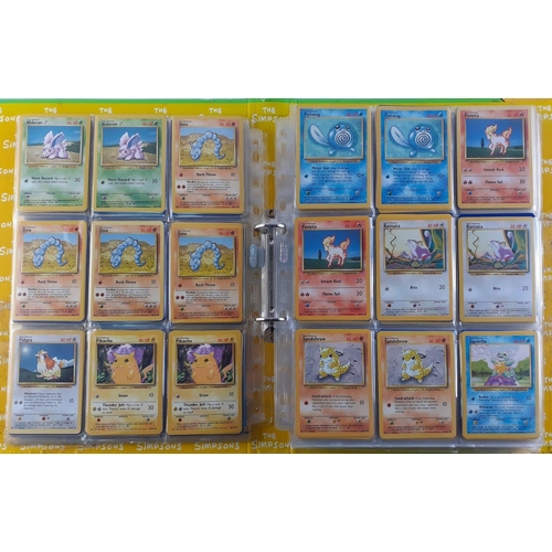 A folder of POKEMON cards. A substantial collection over 14 double ...