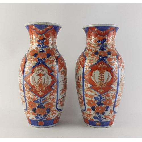 309 - ANTIQUE JAPANESE - An attractive pair of Japanese Imari vases each 31cm high.  Both have historic re... 