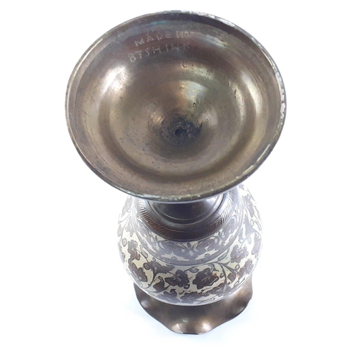 313 - Signed Indian brass and inlaid enamel vase in very nice condition. Stands 24cm tall.#91