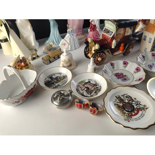 338 - A mixed lot of decorative items. To include COALPORT and ROYAL DOULTON Ladies, bells, pretty miniatu... 