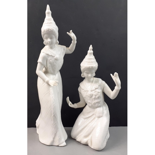 357 - Two white ceramic unbranded Balinese dancers taller 23cm approx, slight damage to the finger tips un... 