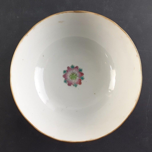 A hand painted Chinese rice bowl in Red Dragon and Phoenix Famille Rose ...