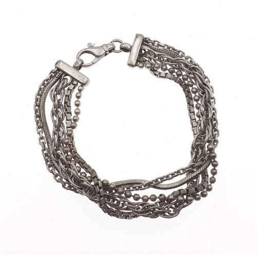 104 - A multi strand 925 Silver bracelet in good order with working clasp. Weight 25.7g approx#126