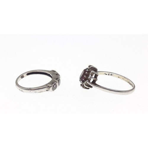 107 - Two rings. One size P stamped 9ct SIl 2.2g , The other size N marked PK CZ 2.8g#129