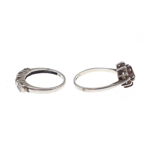 107 - Two rings. One size P stamped 9ct SIl 2.2g , The other size N marked PK CZ 2.8g#129