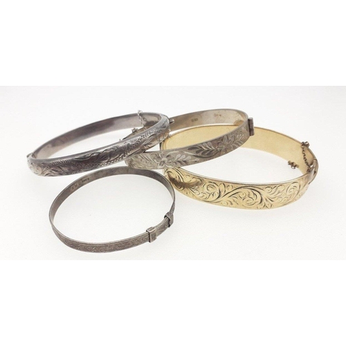 116 - Three silver bangles. A Christening bangle and two other larger. Gross weight 31g apoprox. Also one ... 
