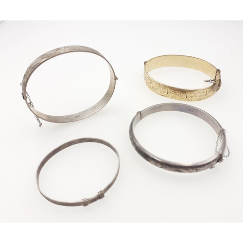116 - Three silver bangles. A Christening bangle and two other larger. Gross weight 31g apoprox. Also one ... 