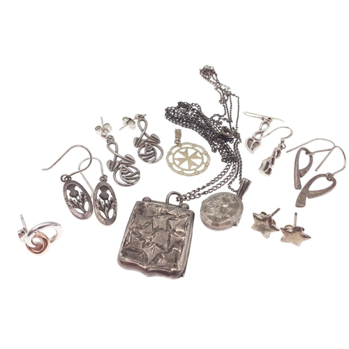 118 - A small quantity of silver earrings, and pendant. Gross weight 19g (excluded plated chain).#140