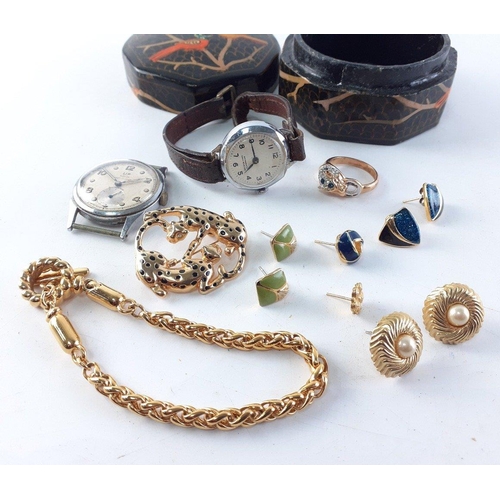 135 - Two papier mache small boxes filled with earrings, rings, pretty brooches, two vintage watches and o... 