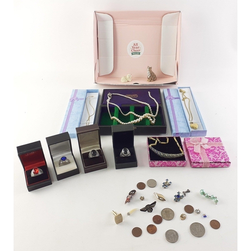 137 - A quantity of attractive jewellery. Including four unmarked pewter rings, pearls, and others.  Inclu... 