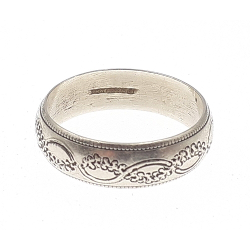 17 - A 375 hallmarked white gold band.  size R, weight 4.7g approx#17