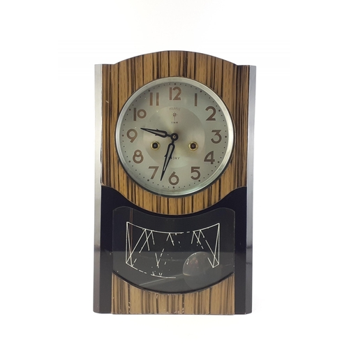188 - POLARIS 15 Day vintage wall clock. With pendulum. No key. 45cm tall.  Some wear to finish but a styl... 