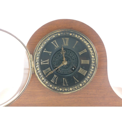 191 - A stylish black faced Napoleon Hat shape mantle clock. Pendulum, no key. stands 23cm. untested.#217... 