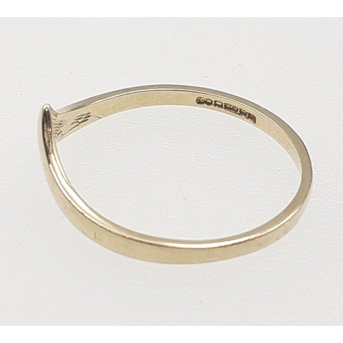 21 - A hallmarked 9ct wish bone ring Size M weigh 0.95g approx#21