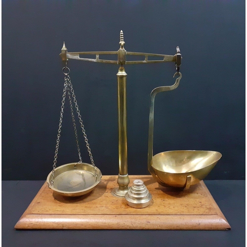 290 - A superb set of antique brass shop scales with weights by DAY & MILLWARD.  On nice wooden base a... 