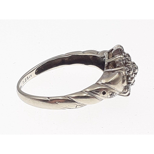 3 - A 375 fully marked white gold ring set with a diamond cluster of small stones (some missing).  Size ... 