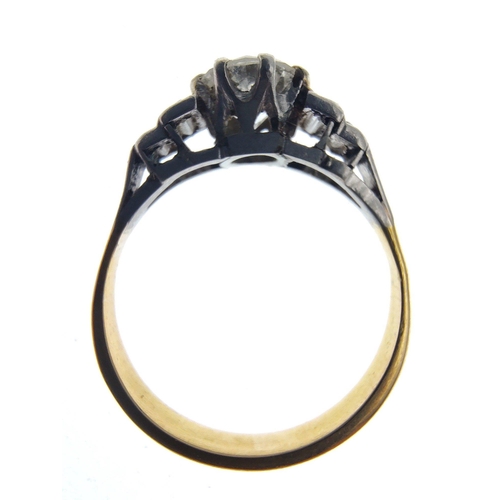 30 - A stunning Diamond ring with a 5.3mm centre stone and four baguette shoulder diamonds.  The shaft ap... 