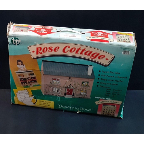 312 - TP ROSE COTTAGE wooden play set Dolls House. Appears complete in box.#338