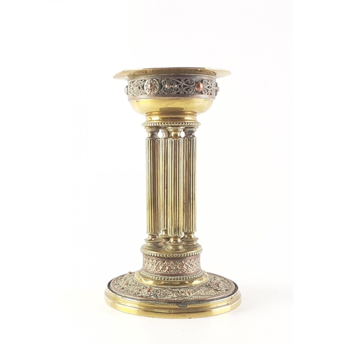 313 - Vintage brass highly ornate four pillar candle holder with four fluted colums on detailed base, aver... 