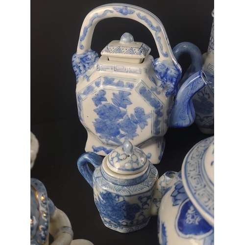 326 - A good collection of Oriental Ceramic pieces to include interesting teapot model of child with dog (... 