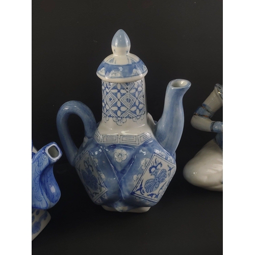 326 - A good collection of Oriental Ceramic pieces to include interesting teapot model of child with dog (... 