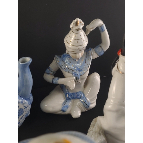 326 - A good collection of Oriental Ceramic pieces to include interesting teapot model of child with dog (... 