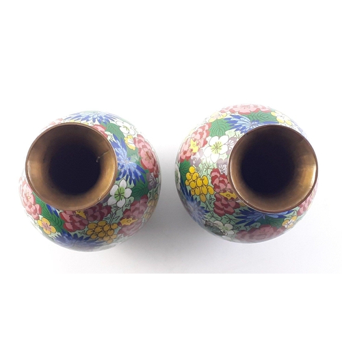 330 - A pair of cloissone on metal matching vases.  Each 17cm .  One has a small dent noted to the finish ... 