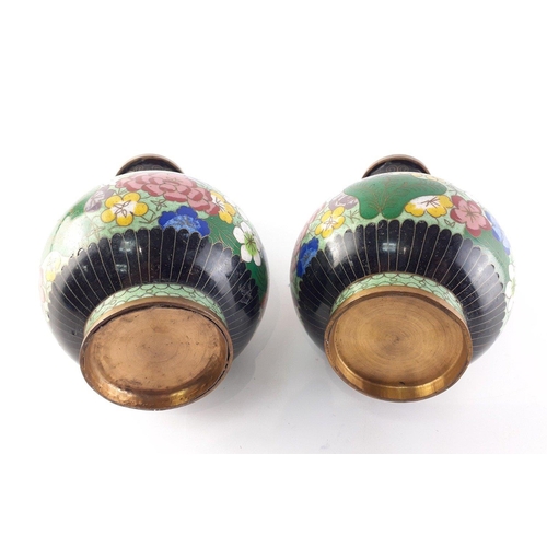 330 - A pair of cloissone on metal matching vases.  Each 17cm .  One has a small dent noted to the finish ... 