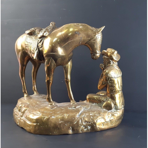 386 - SUPER HEAVY! - A wonderful CAST BRASS  study of a cowboy playing a harmonica with his saddled horse ... 