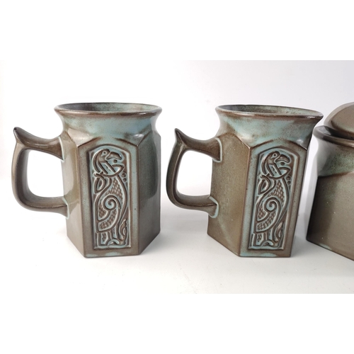412 - A vintage TYN LLAN Welsh pottery griffin design set comprising 4 mugs, coffee pot and sugar bowl. Sl... 