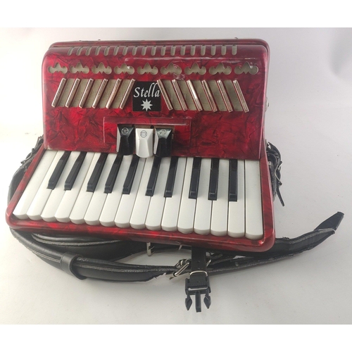 421 - A STELLA basic Accordion in case. 16 keys and 48 buttons. In nice condition#449