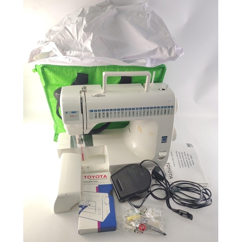 449 - TOYOTA RS2000 series Sewing Machine. Working, with mains cable, instructions and pedal. Good quality... 