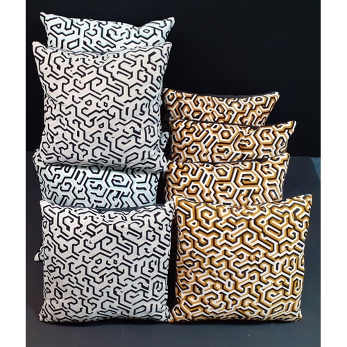 470 - Ten ONE NINE EIGHT FIVE geometric design cushions, in mint green and tan. Measure approx 35cm x 35cm... 
